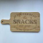 Engraved wooden chopping board with snacks design